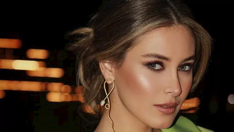 الأبيض يليق بها.. ملكة جمال لبنان تخطف الأنظار بإطلالتها