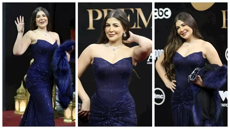 ملك قورة تخطف الأنظار بفستان أزرق أنيق في حفل المتحدة (صور)